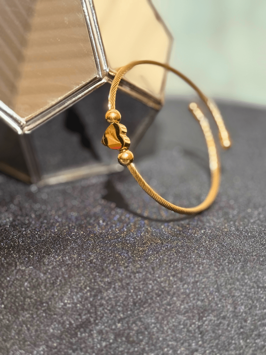 Eternal Twist Bangle Gold
