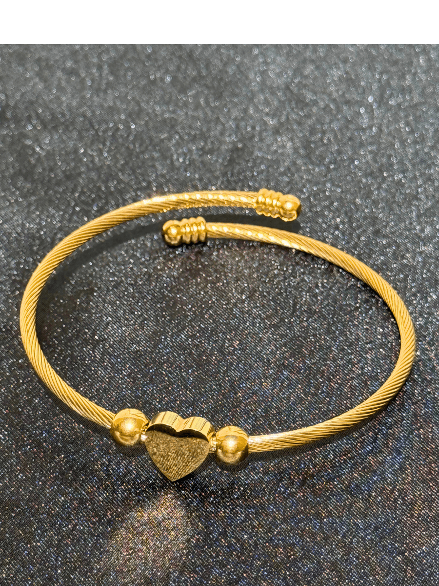 Eternal Twist Bangle Gold